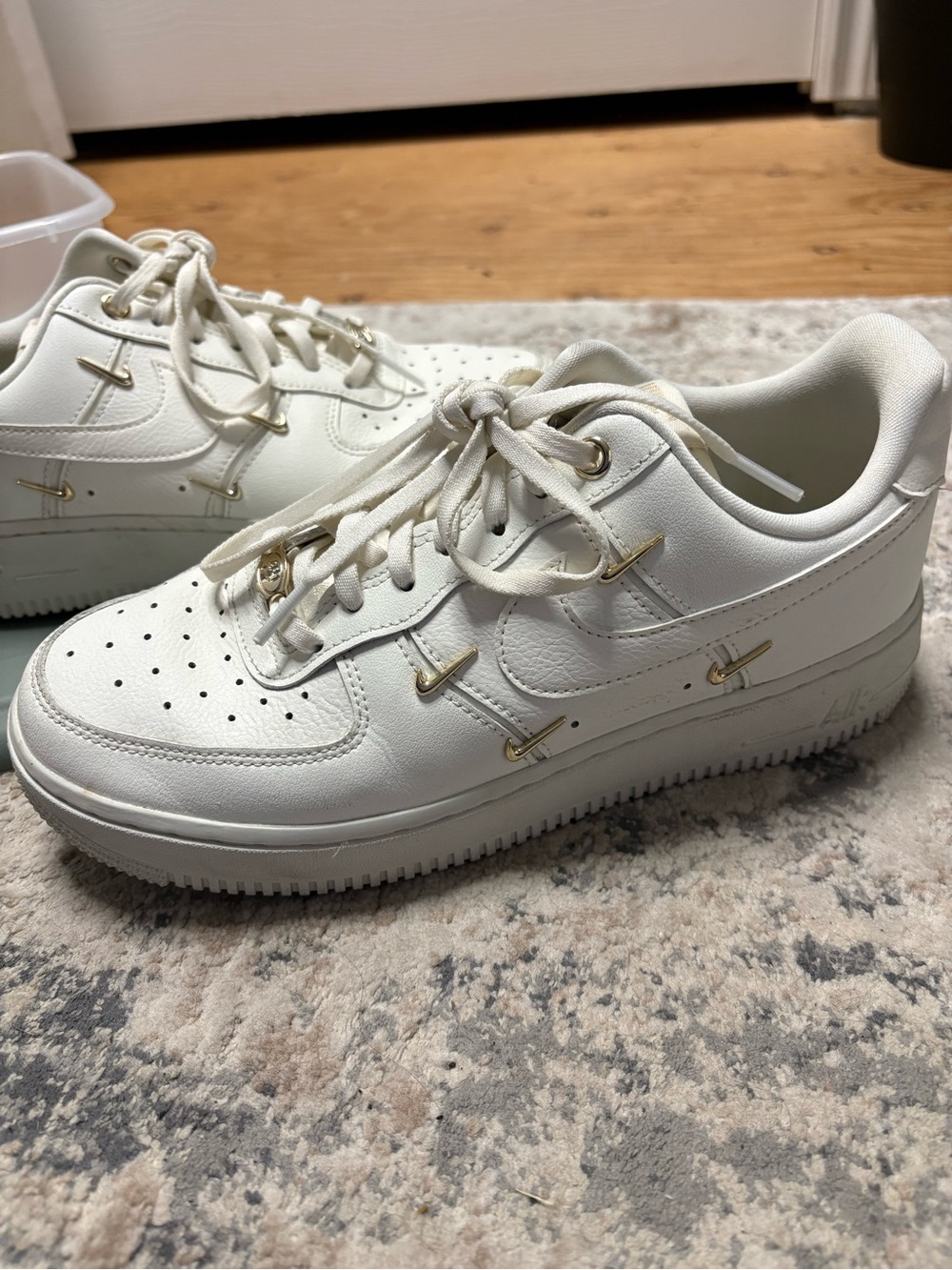 White Nike Air Force 1 with Gold Nike Charms